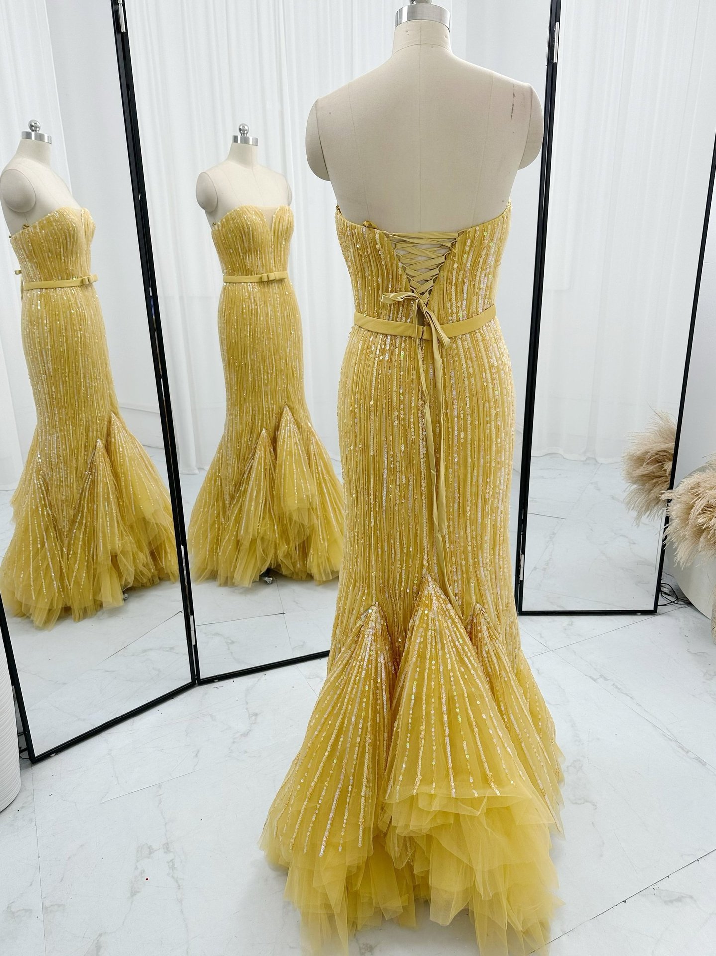 Golden yellow sequin mermaid gown with lace-up corset back
