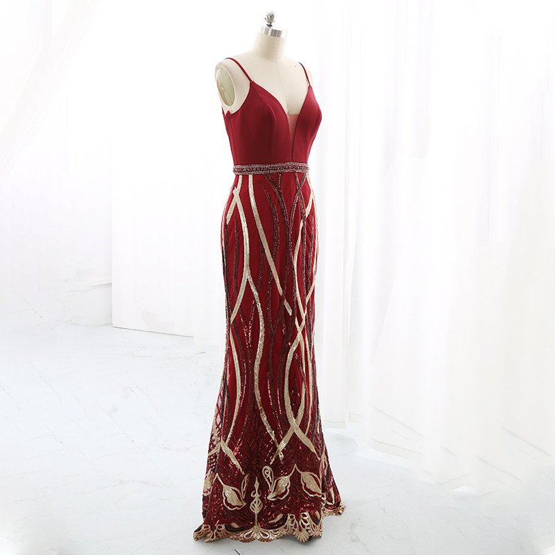 Full-length burgundy and gold sequin formal gown front view