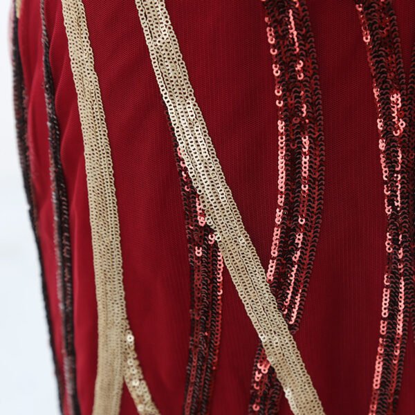 Burgundy and gold geometric sequin embroidery detail